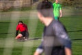 Teens playing football